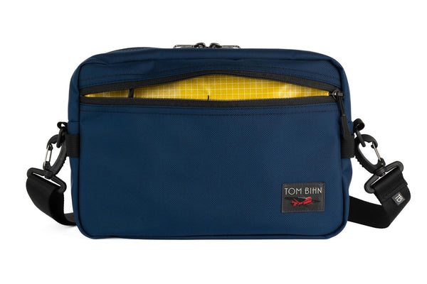 The Side Hustle in Deep Blue Ballistic with Solaris 200 Halcyon interior.